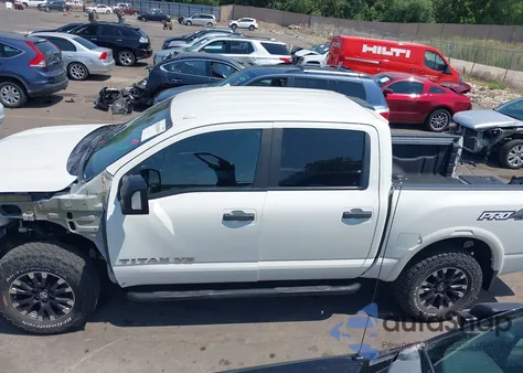 2018 Nissan Titan Pro-4X from USA, damaged, VIN 1N6AA1E54JN551139